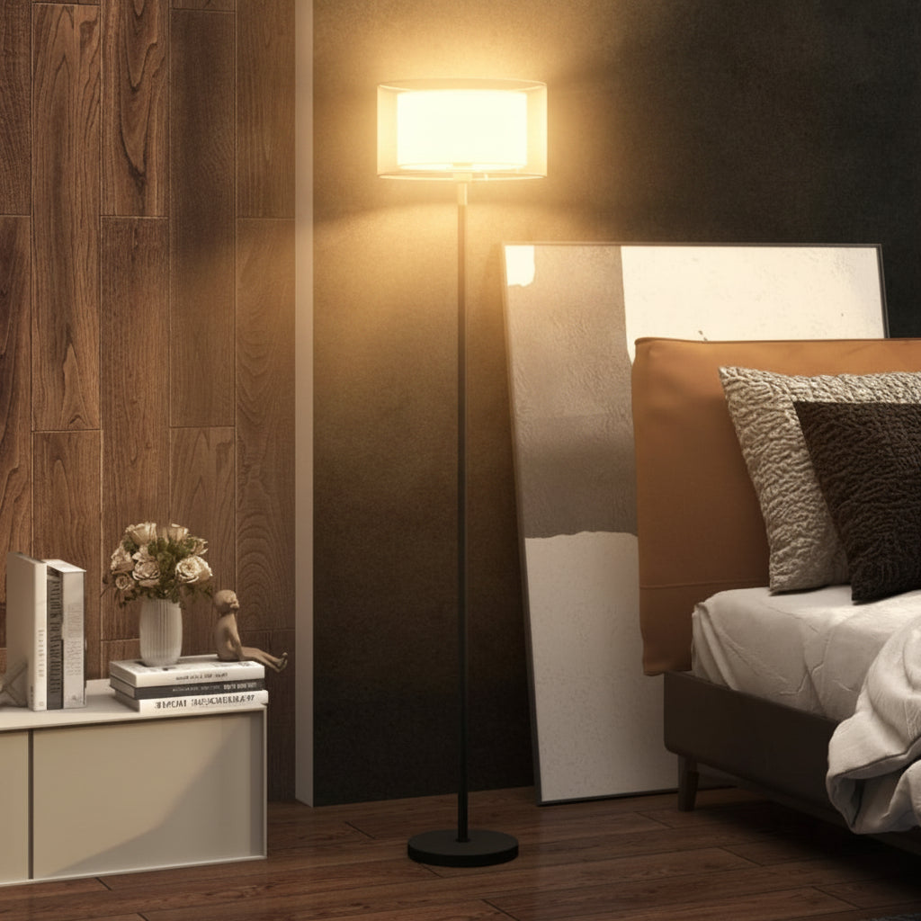 Modern bedroom with bed, floor lamp, and side table.